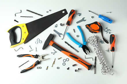 Work tools on white background, top view, an Industrial Photo by AtlasStudio PRO