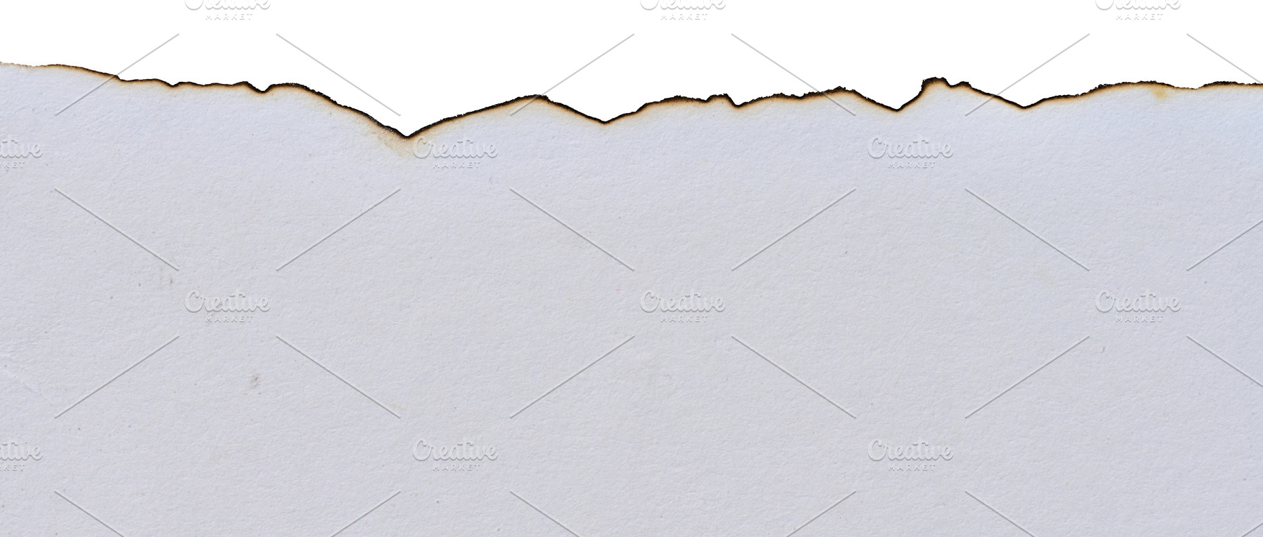 Torn edge of white blank sheet of paper with faded ends on isola, an Abstract Photo by ndanko