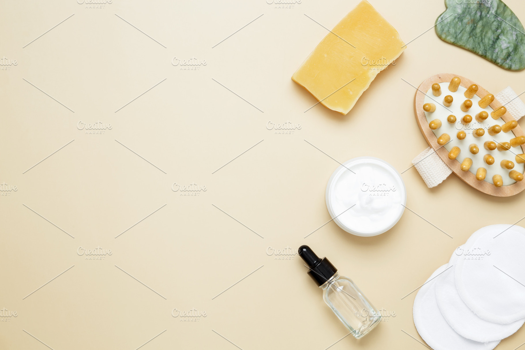 Skincare set with gua sha, wooden body brush, facial cream and serum for natura, a Photo by matucha