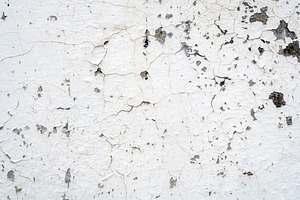 Cracked texture of an old wall with peeling paint, an Abstract Photo by GoodGoods
