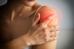 Shoulder Pain Highlighted in Young Woman, a Health & Medical Photo by Davizro's Market
