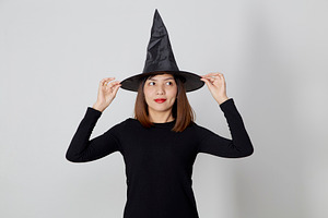 Young woman in hat and dress as a wi stock photo containing asian and
