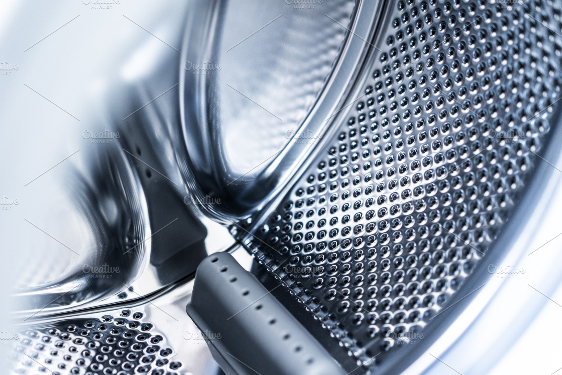 Inside Laundromat Washing Machine, a Photo by Viktor Hanacek