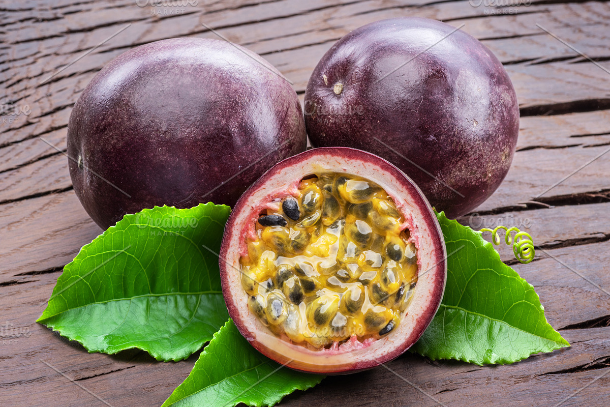 Purple passion fruits and it's half, a Food & Drink Photo by Volff (Photo 1 of 2)