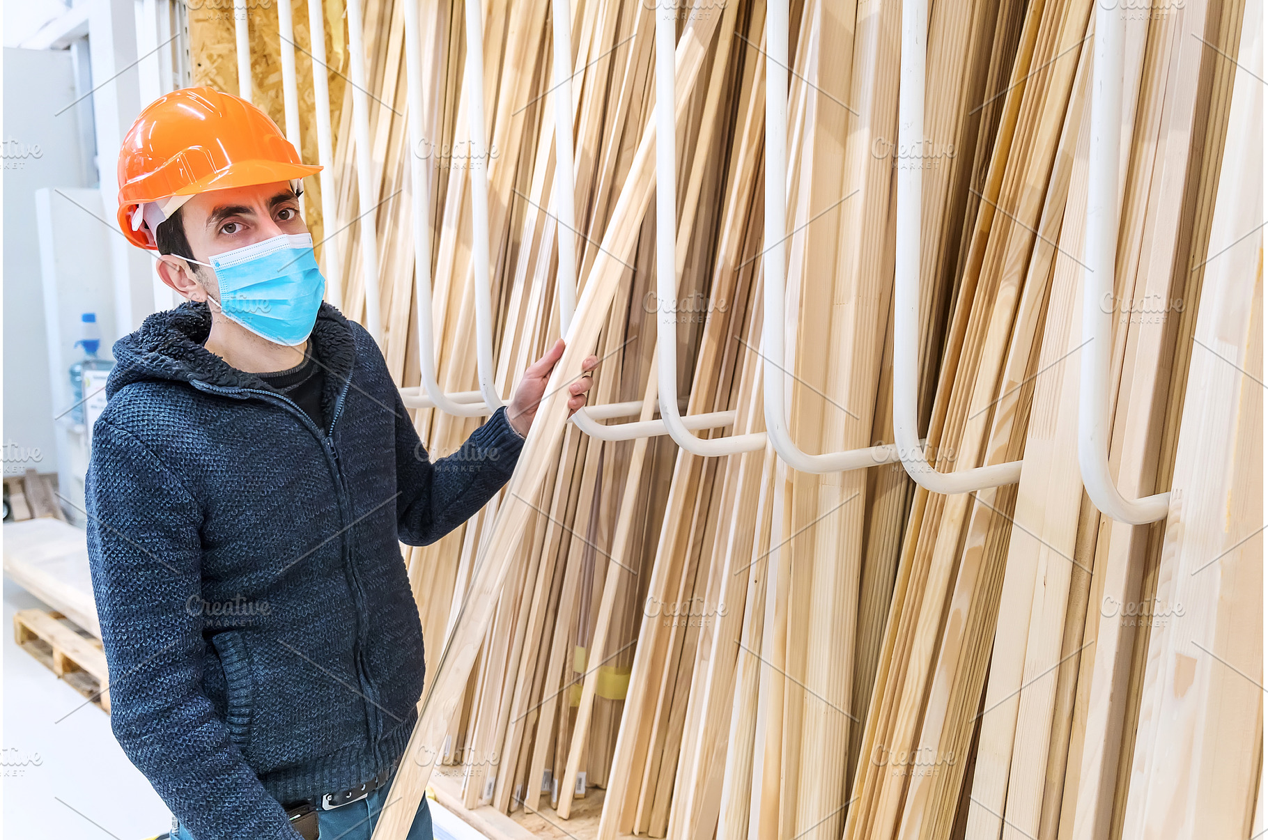 A man in a hardware store. Sells, a Person Photo by yanadjana