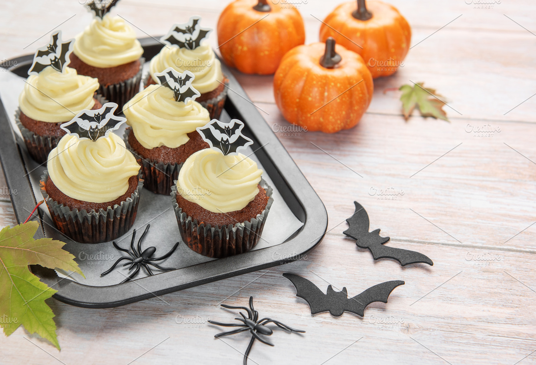 Halloween cupcakes decorated with bat and spider decorations, a Food & Drink Photo by Olena Rudo