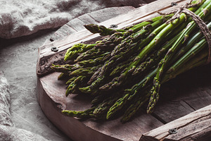 Asparagus on a cutting board health containing background, food, and spring