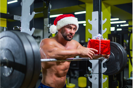 Young muscular attractive Santa