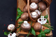 Fresh champignon mushrooms on dark wooden table, a Food & Drink Photo by eleana (Thumbnail 3 of 3)