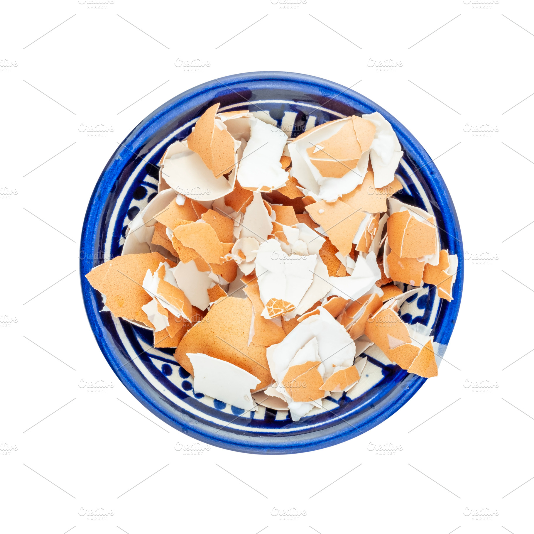 Pile of broken eggshell in bowl, a Food & Drink Photo by BOOCYS