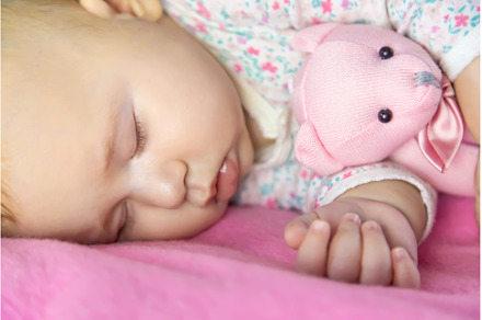 Baby sleeps with a bear. Selective, a Person Photo by yanadjana