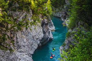 Kayakers exercising on the river, a Sports & Recreation Photo by Alpine Dreams