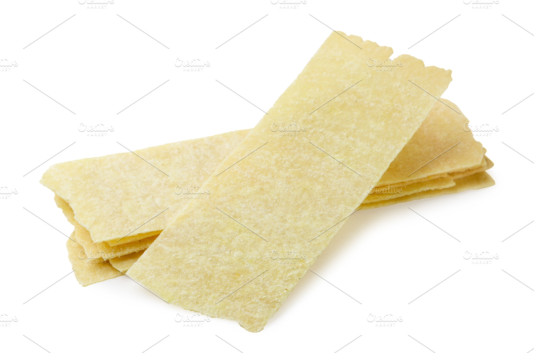 Long potato chips on a white, a Food & Drink Photo by innakreativ