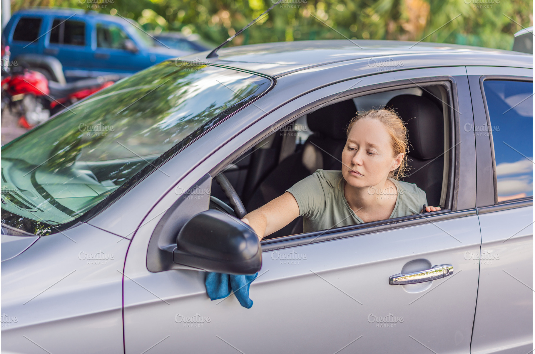Woman cleaning her car, organizing, a Person Photo by Elizaveta Galitskaya