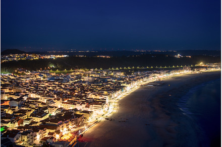 Night time cityscape of Nazare, an Architecture Photo by Nature and travel