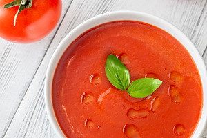 Minimal tomato soup with basil and o, a Food & Drink Photo by Alexander Prokopenko