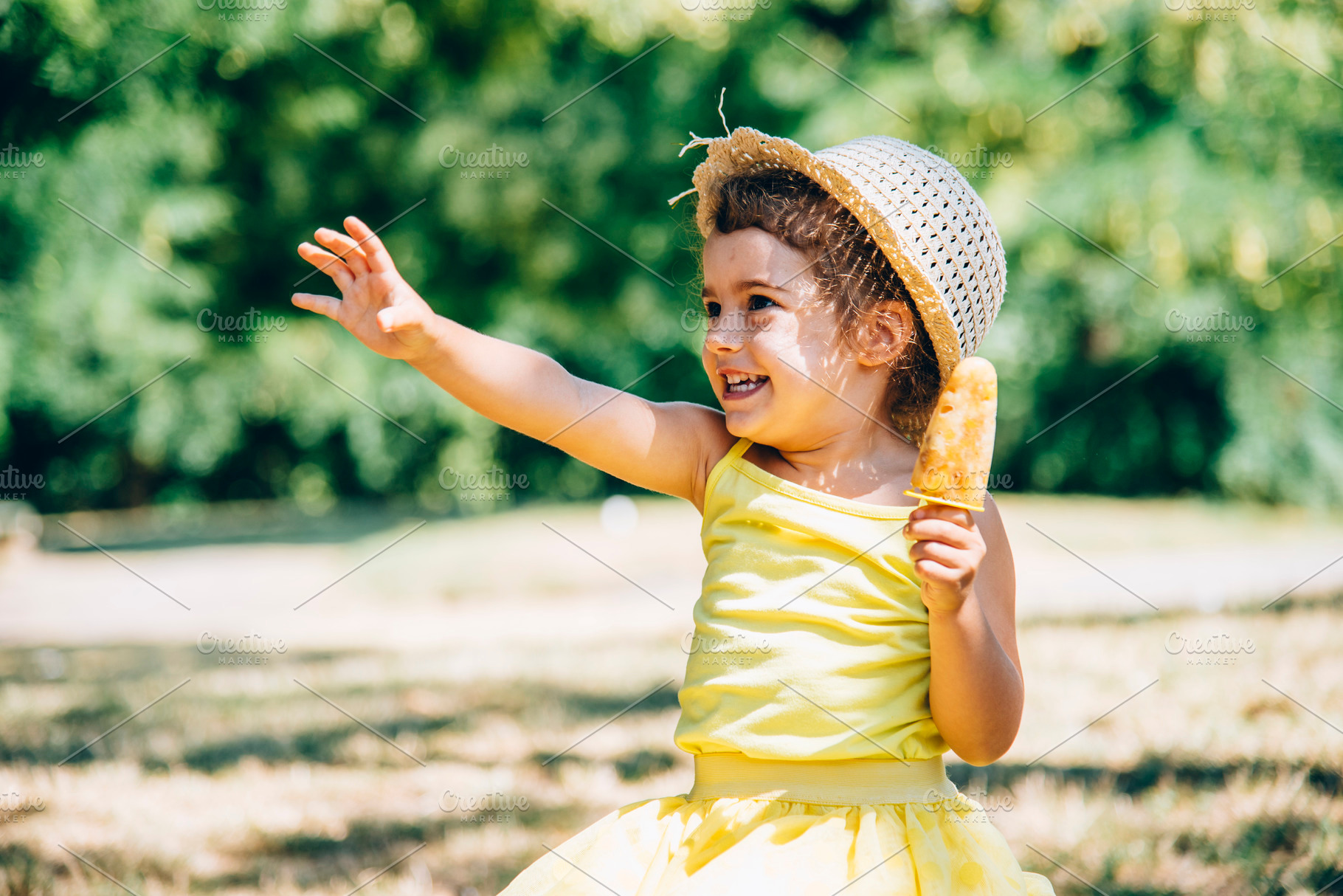 Little girl eating ice cream, a Person Photo by hitdelight