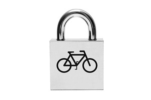 Silver padlock with bicycle, a Photo by saiko3p
