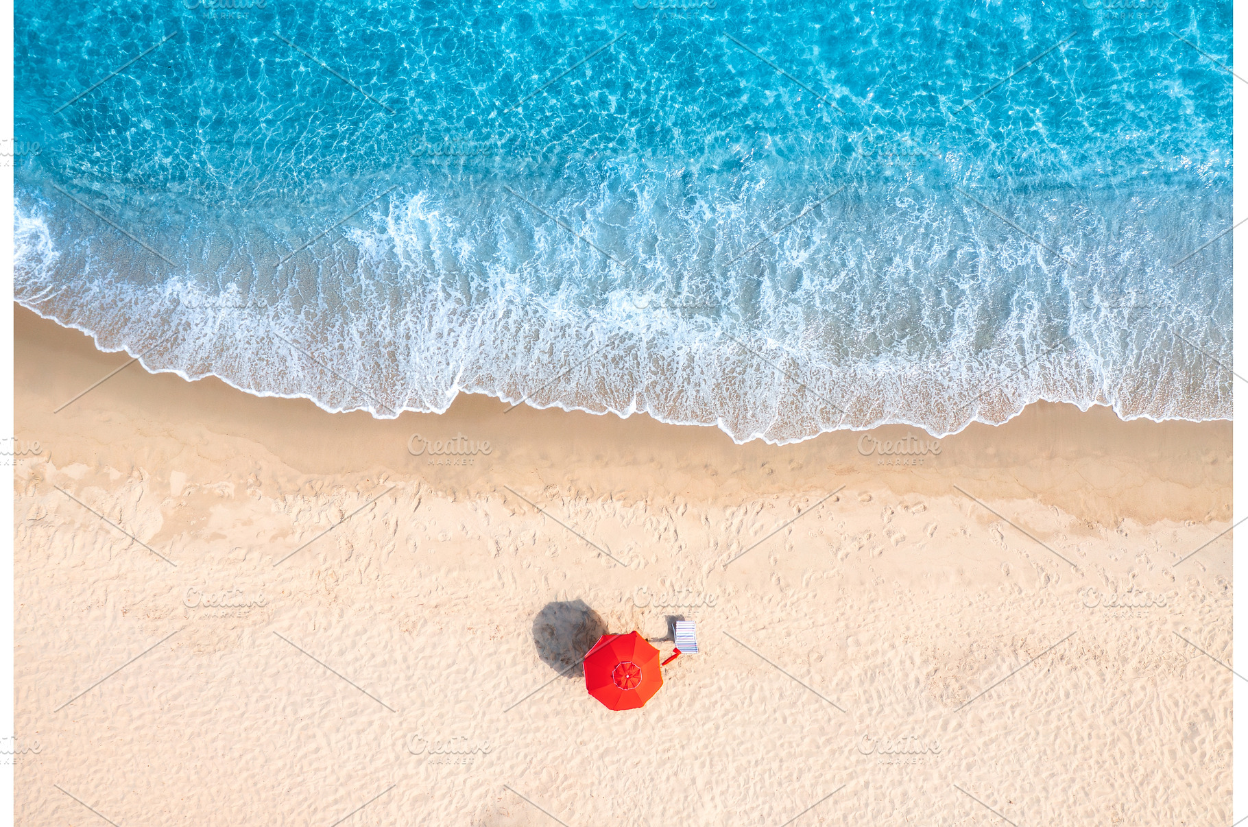 Aerial view of red umbrella on white, a Nature Photo by den-belitsky