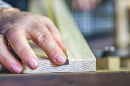 Carpenter's hand measuring in a carp, a Person Photo by davidpereiras
