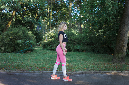 Side view of fit young woman, a Photo by borodai94