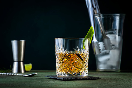 White negroni, alcoholic cocktail with dry gin, white vermouth a, a Food & Drink Photo by 5PH