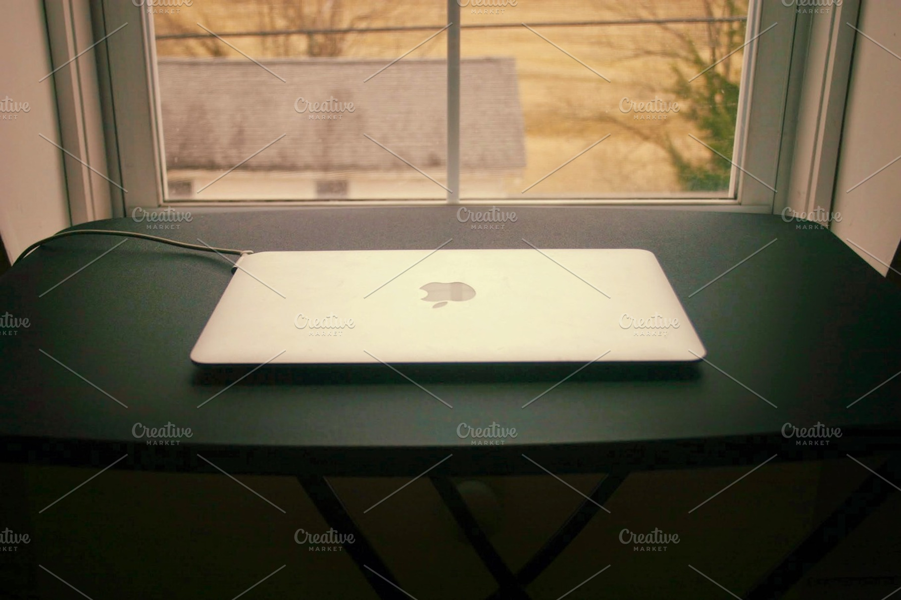 Apple Macbook AIr in Country Setting, a Business Photo by Shop Worth
