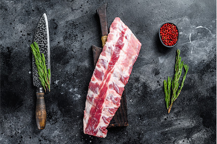 Raw lamb loin spare ribs on a