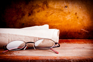 Old Glasses on Desk, a School & Education Photo by THP Creative