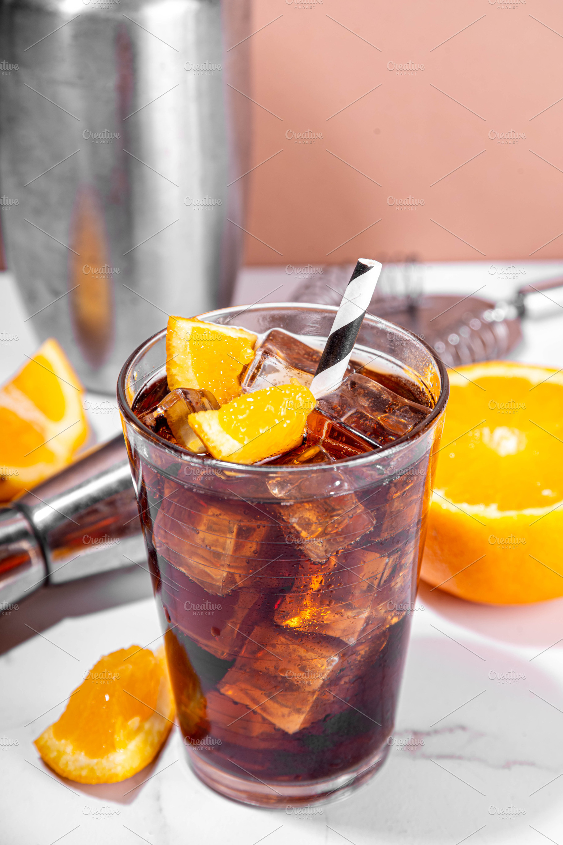 Cold summer cocktail with cola and oranges, a Food & Drink Photo by Rimma