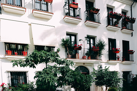 White exterior facade of a building, an Architecture Photo by Edalin's Store