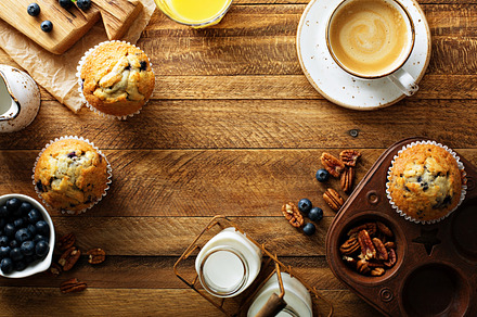 Freshly baked blueberry muffins in a rustic setting featuring freshly, baked, a Food & Drink Photo by farwasser