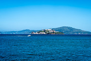 Alcatraz Island surrounded by blue waters in San Francisco Bay,, an Architecture Photo by GoodGoods (Thumbnail 2 of 2)