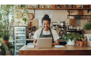 Asian female cafe owner using a, a Person Photo by Sergey Kotenev