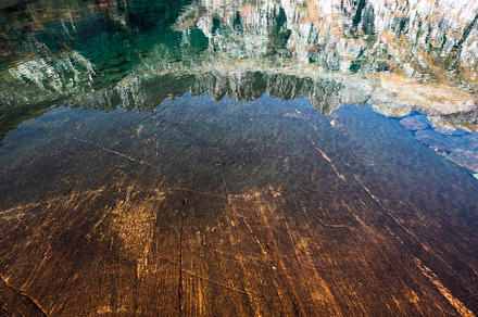 Water lake on mountain rock, a Background Photo by Simmi Simons