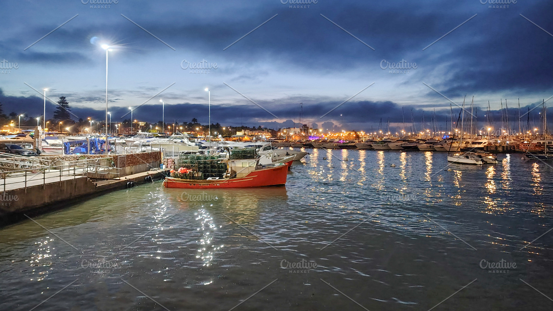 Night landscape scene at port of punta del este city, uruguay, a Photo by DanFLCreativo