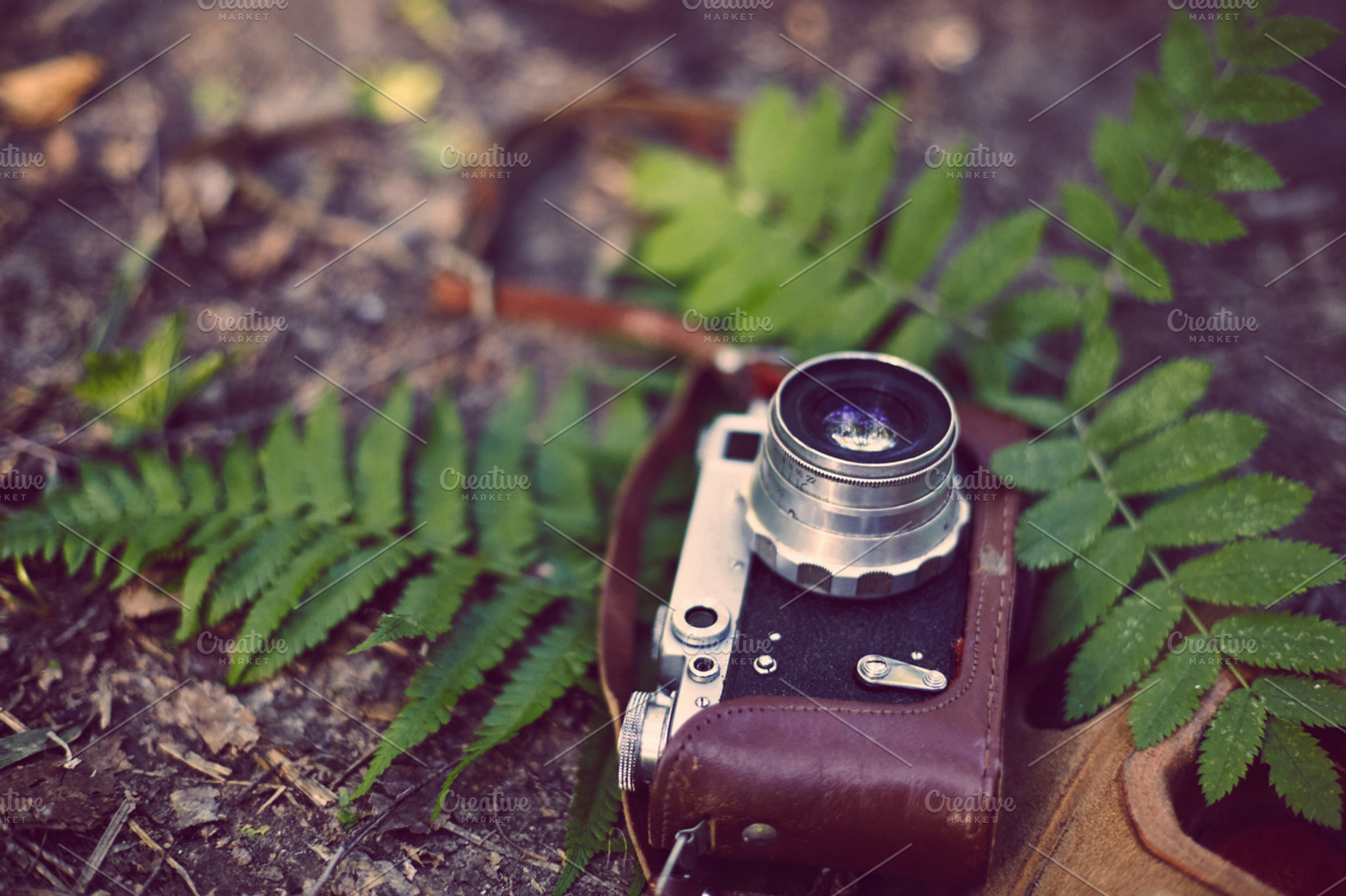 Vintage analog retro film camera in featuring camera, retro, and vintage, an Arts & Entertainment Photo by ArtChamomile