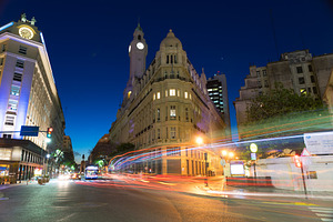 Nighttime scene in the city of featuring light, aires, and alley