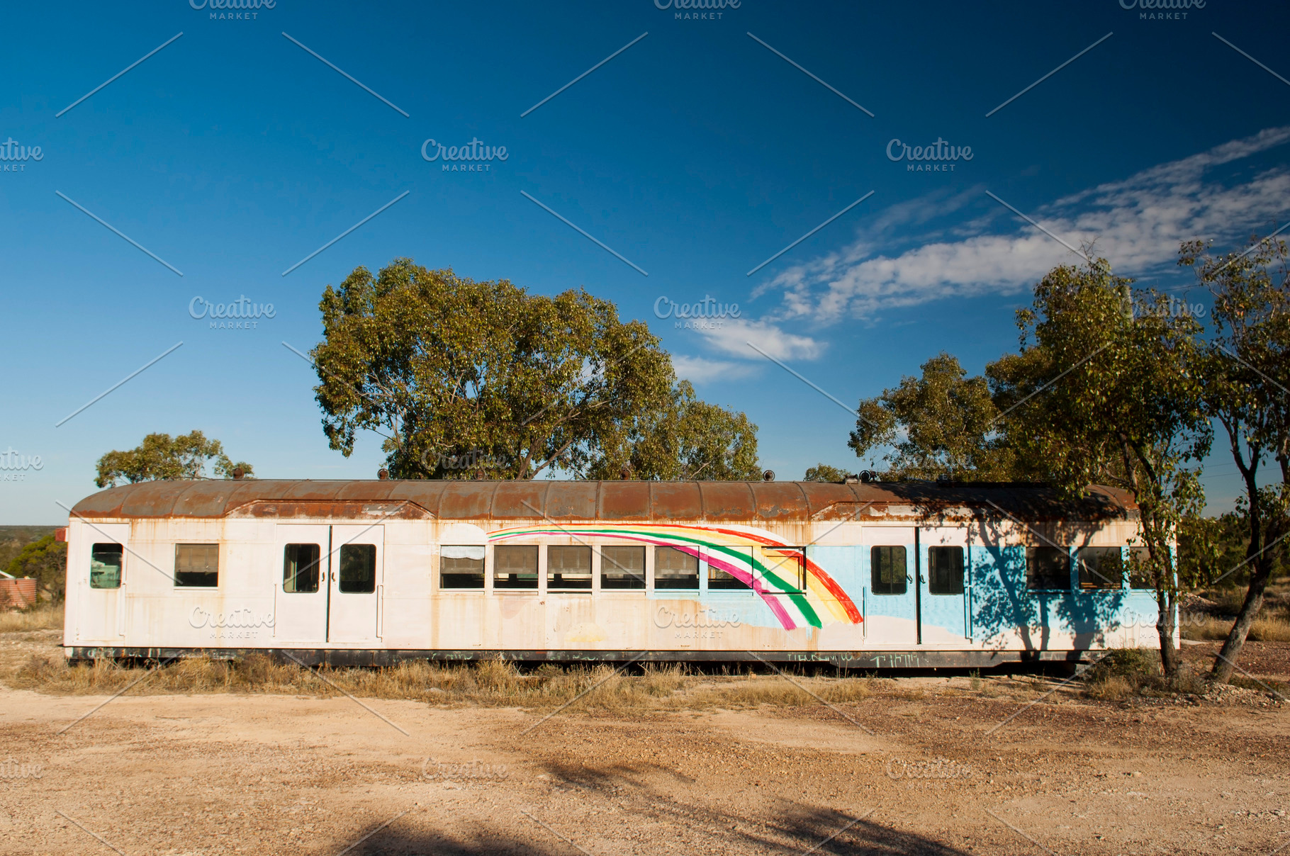 Train with Rainbow, a Transportation Photo by THP Creative