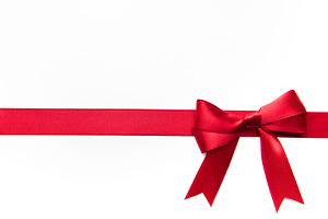 Red satin ribbon and bow for celebration designs, a Holiday Photo by Olena Rudo