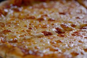 Fresh homemade cheese pizza, a Food & Drink Photo by AlyaAnd