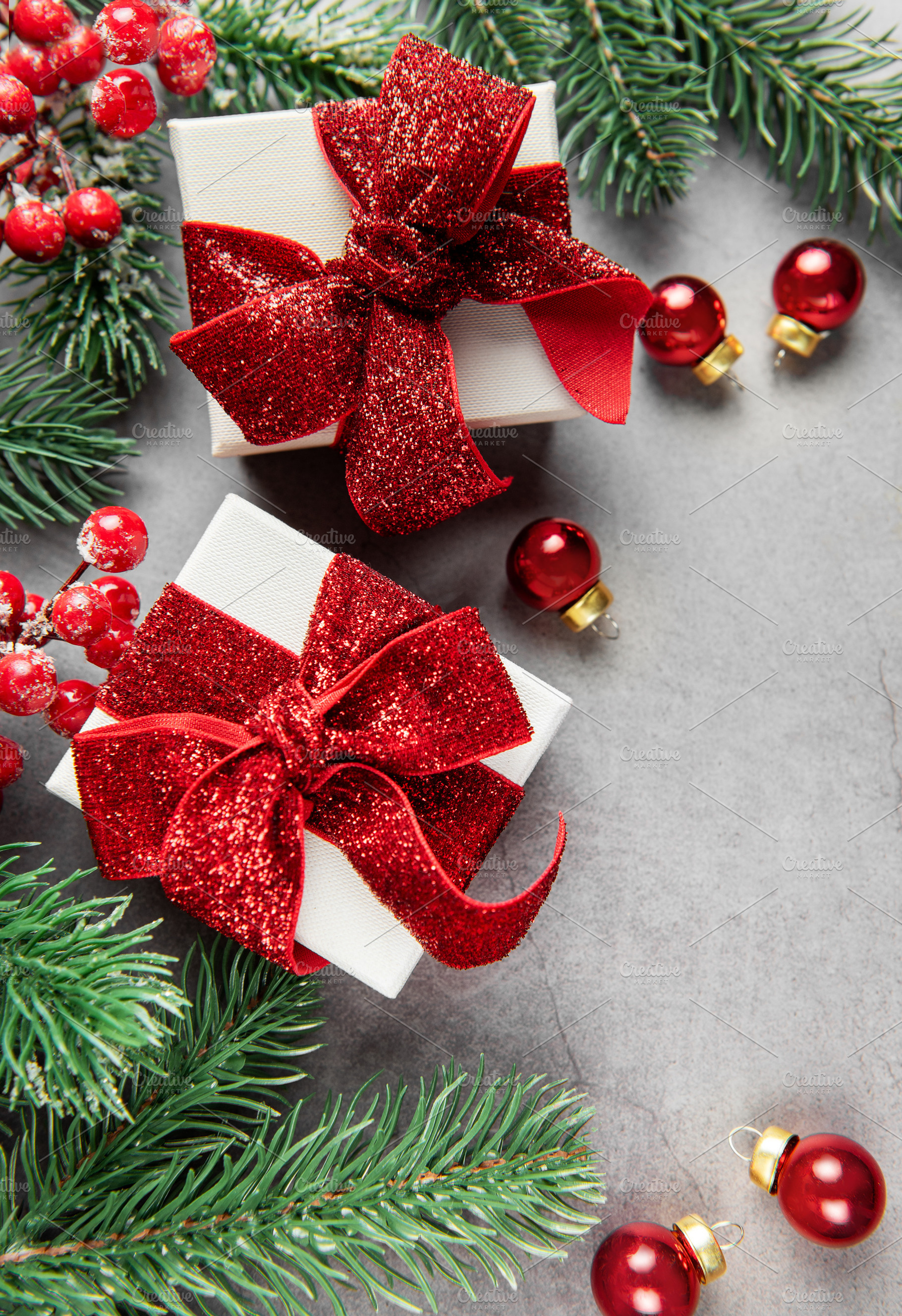 Christmas gifts and decorations on gray background, a Holiday Photo by Olena Rudo