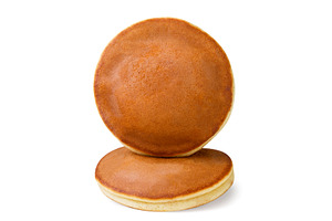 Two pancakes stand on top of each, a Food & Drink Photo by innakreativ