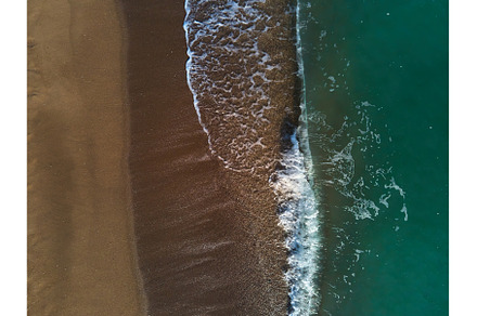 Aerial view of sandy beach and sea, a Nature Photo by IlliaBondarPhotography