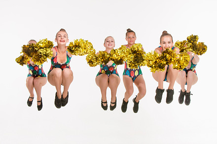 The group of teen cheerleaders jumping at white studio stock photo containing, a Person Photo by Volodymyr Melnyk