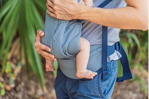 Young father walks in nature with, a Person Photo by Elizaveta Galitskaya