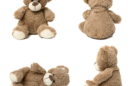 cute brown teddy bear against white isolated background in diffe, an Abstract Photo by ndanko