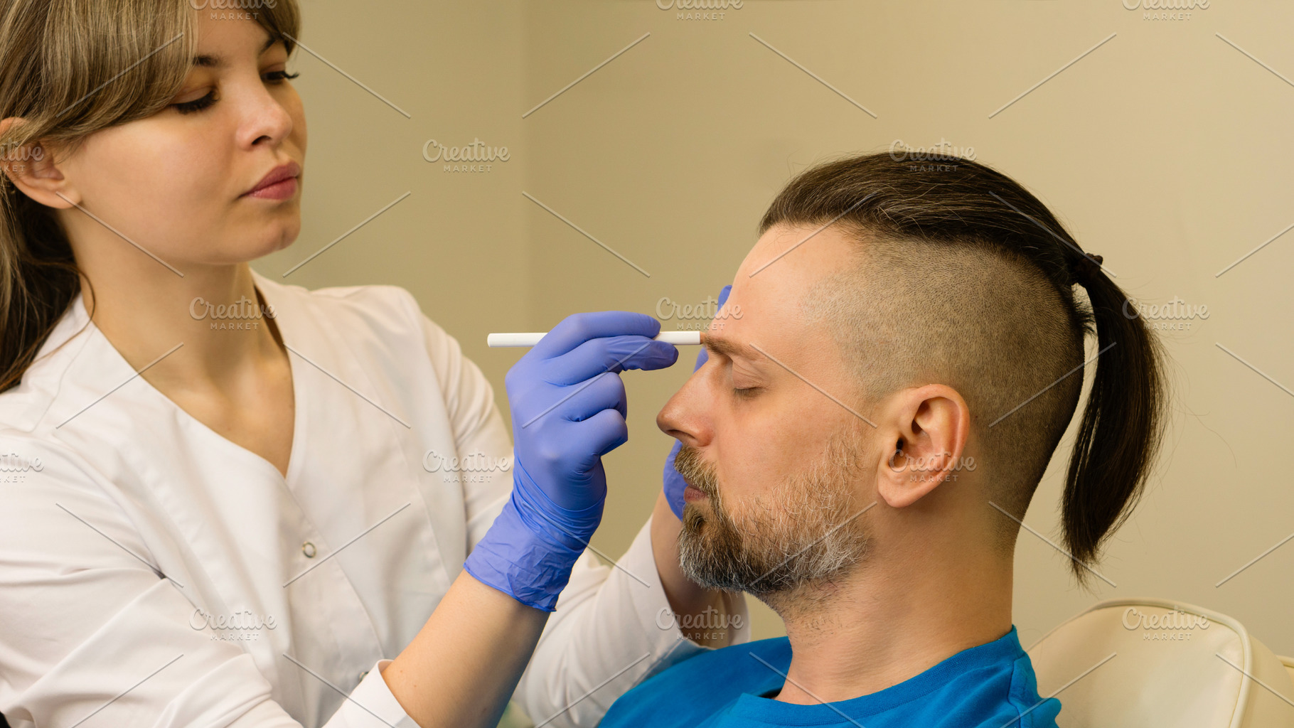 Marking face man before anti-aging, a Health & Medical Photo by Elena Vagengeim