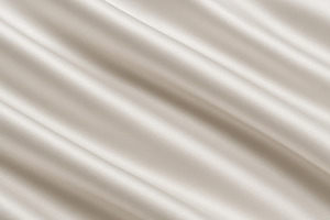 Elegant cloud dancer color satin fabric with flowing texture as, a Photo by Dvoevnore photos