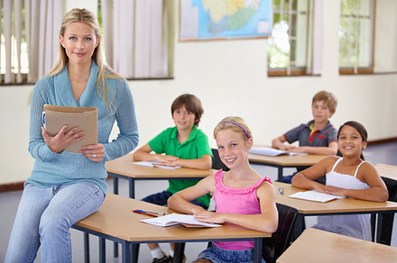 She's a dedicated educator, a Photo by Peopleimages.com
